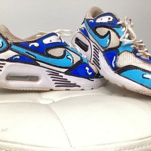 Blue custom painted nike airs.